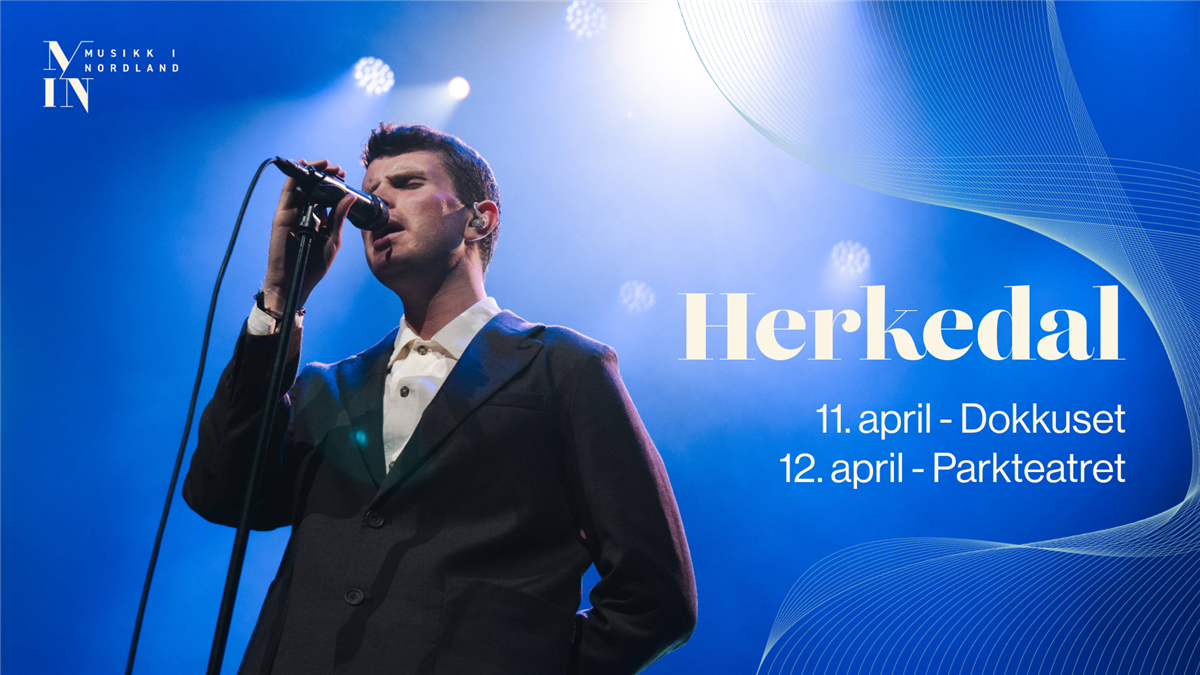 mann synger med blå bakgrunn - Klikk for stort bilde